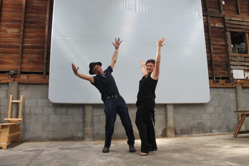 REALLY BIG SCREEN: Gabriele Trabucco and Zoe Collins could not be more pleased with the new cinema screen at ArtWorks on Davadi. Photo Linden Morris / Stanthorpe Border Post REALLY BIG SCREEN: Gabriele Trabucco and Zoe Collins could not be more pleased with the new cinema screen at ArtWorks on Davadi. Photo Linden Morris / Stanthorpe Border Post